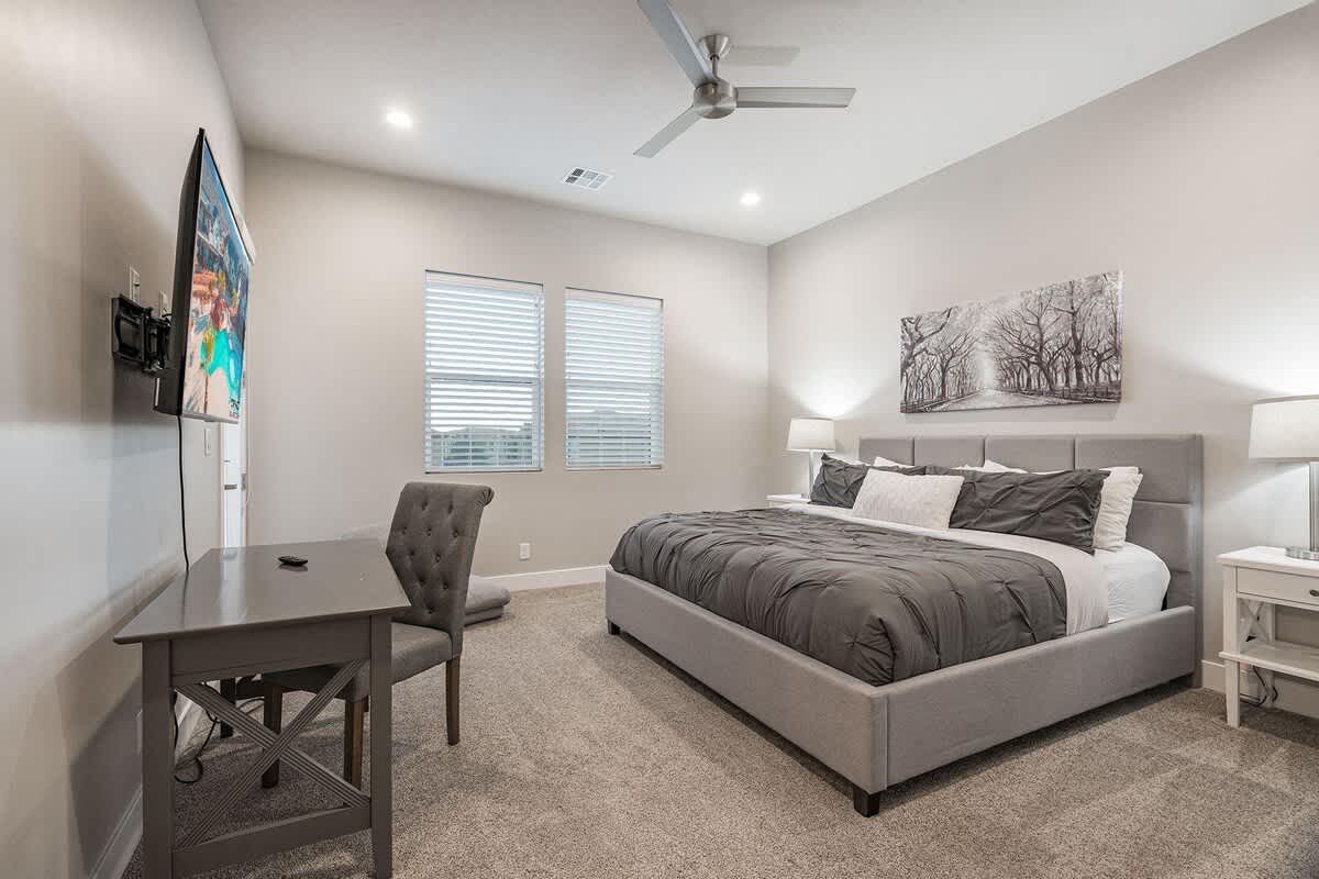 61 - Bedroom 3 with king bed, TV and desk