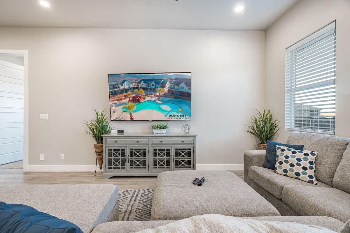 61 - Large living room with lots of seating and large TV