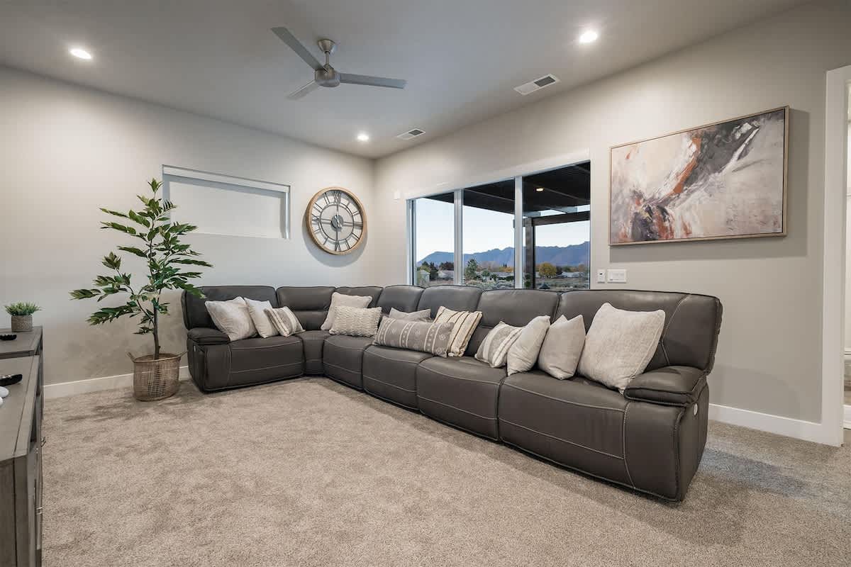 30 - Family room sectional and balcony patio with stunning view