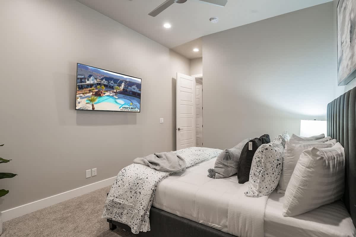 30 - Bedroom 3 with king bed and TV