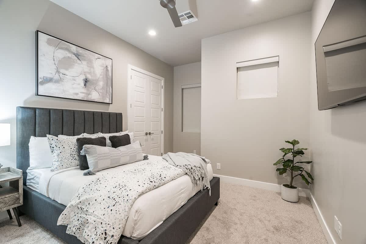 30 - Bedroom 3 with king bed and TV