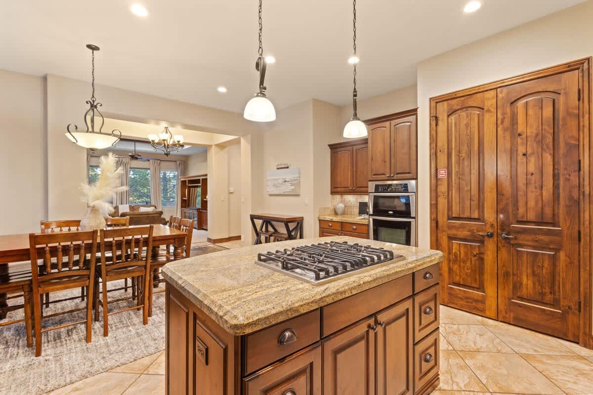 Kitchen island features a cooktop