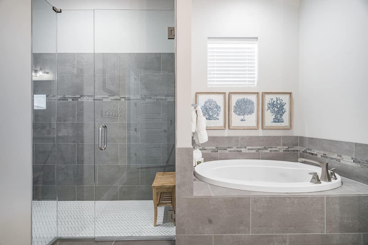 #52 - Master bathroom with glass shower and tub