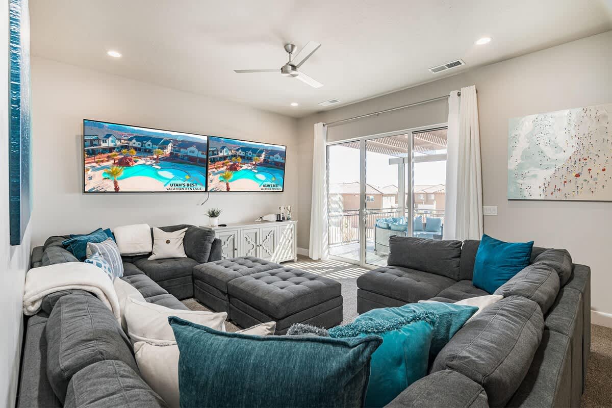 #52 - Family room has access to balcony with large circular sect