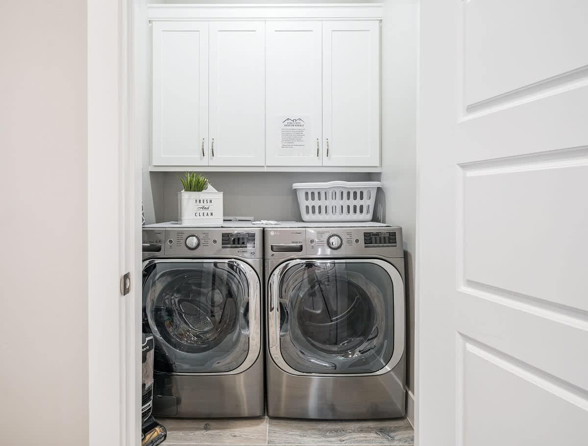 #52 - Upstairs laundry room with washer and dryer provided