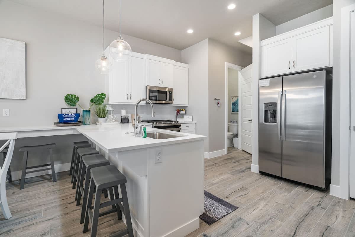 #52 - Gorgeous open concept airy kitchen with extended bar seati