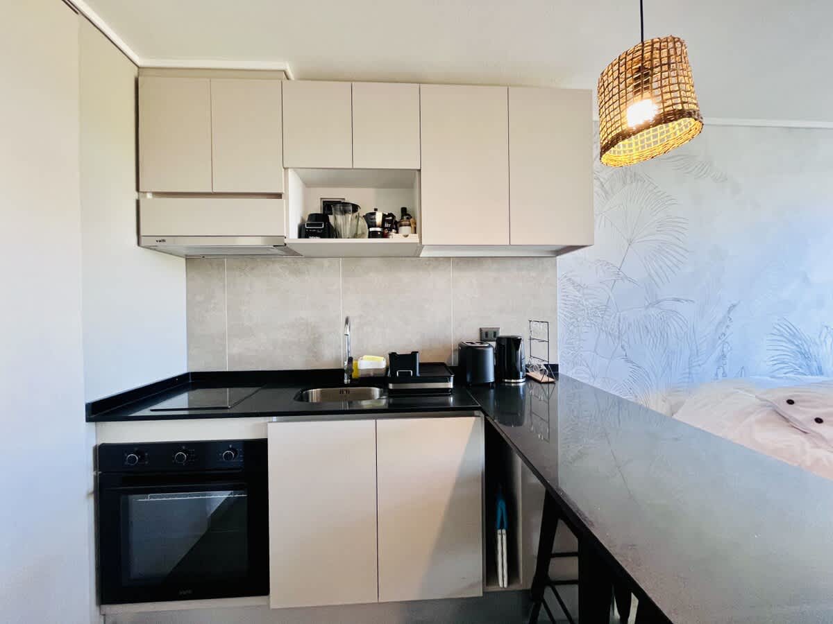 Vibrant Ñuñoa Apartment | Gym Laundry Parking Pool