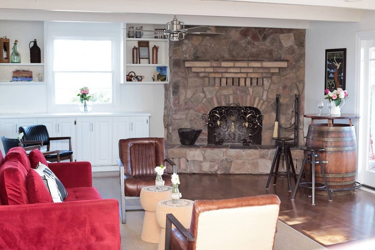 Unwind by the grand stone fireplace—ideal for families after a day exploring, golfers fresh off the green, or teams sharing wine and conversation.