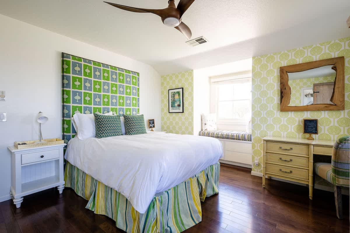 Hampstead Bedroom upstairs: 2 queen beds, bold retro design, private attached bath, and workspace. Perfect for families, wine travelers, or colleagues needing comfort and style near San Martin wineries & golf.