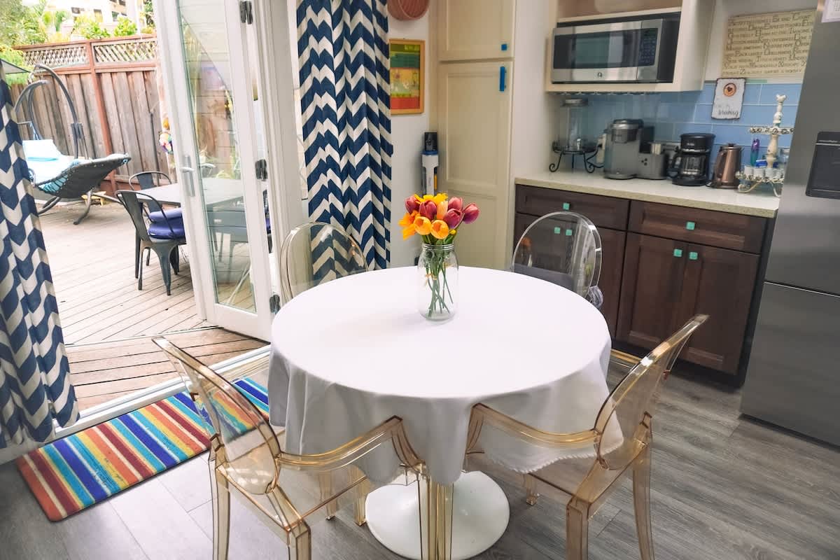Enjoy meals at the sunny dining nook, then step right out to the private patio for fresh air and relaxation. A perfect blend of indoor comfort and outdoor living for romance, family time, or a business recharge.