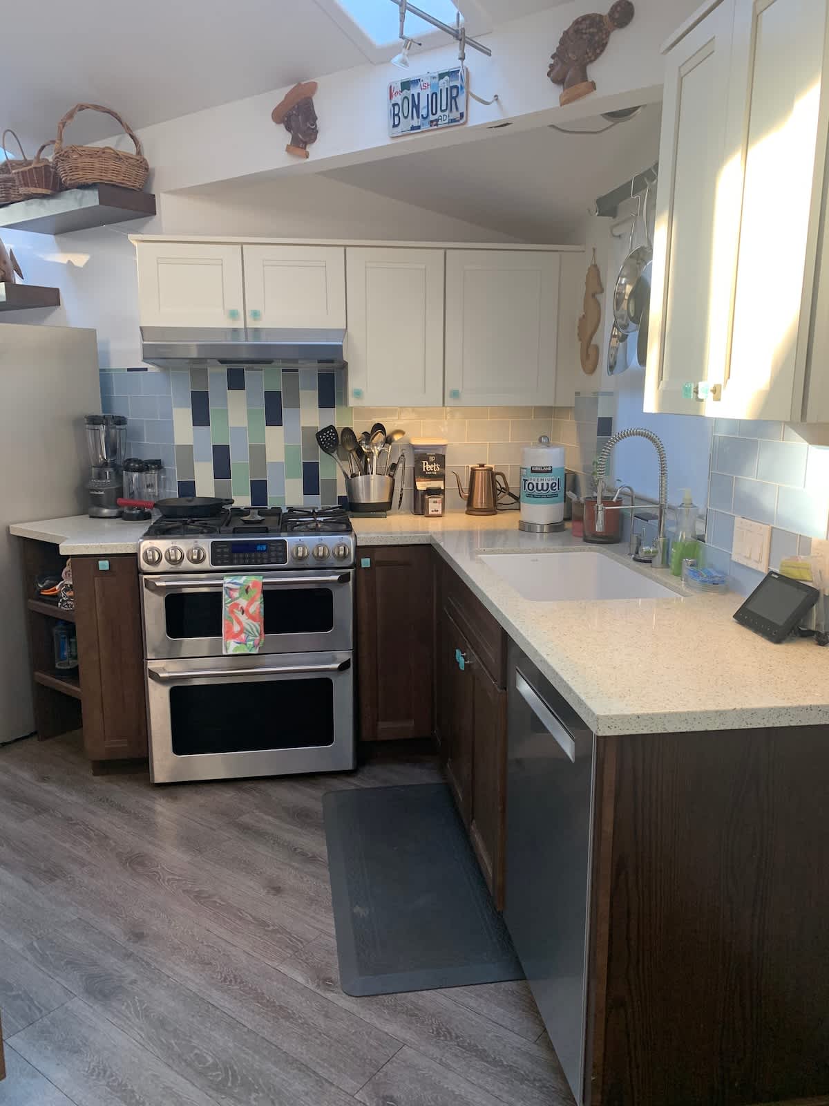 Spacious kitchen with gas stove, oven & dishwasher—ideal for family meals, business traveler convenience, or wine lovers pairing local finds with home-cooked dishes.