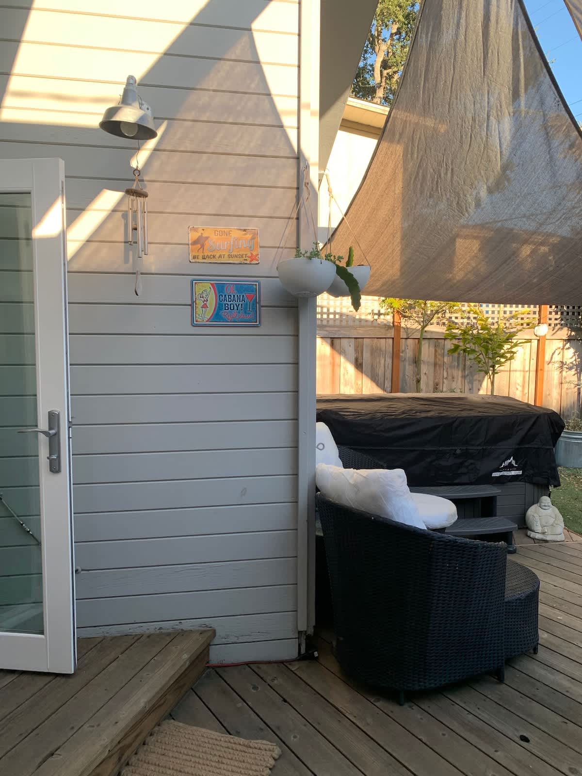 Step onto your private patio retreat with cozy seating and a hot tub just steps away. Perfect for relaxing after a beach day, sipping wine, or enjoying the evening coastal breeze.