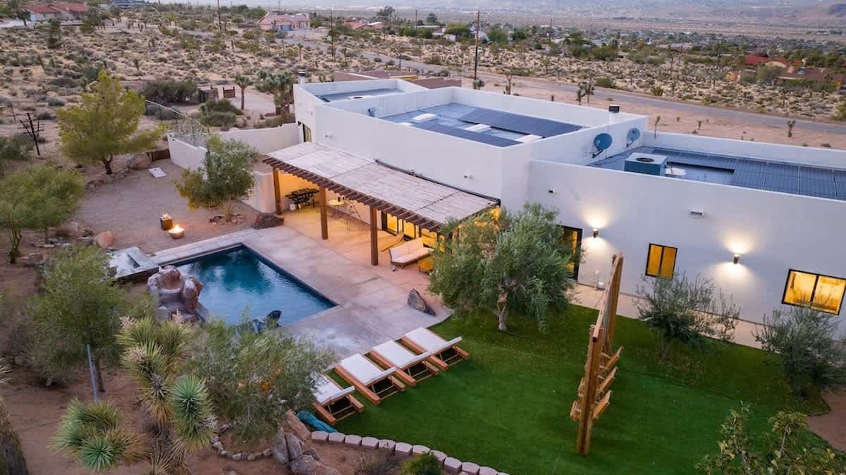 Your own backyard oasis with pool, water slide, hot tub, sun tanning chairs and more!