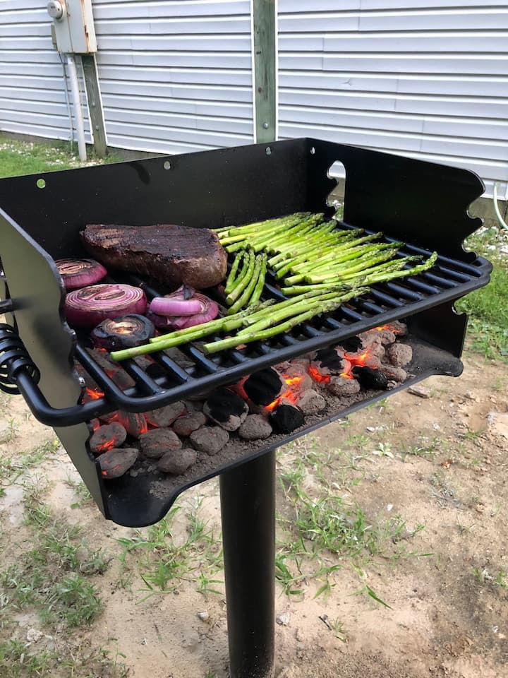 The charcoal grill located downstairs will have the entire family excited for dinner. 