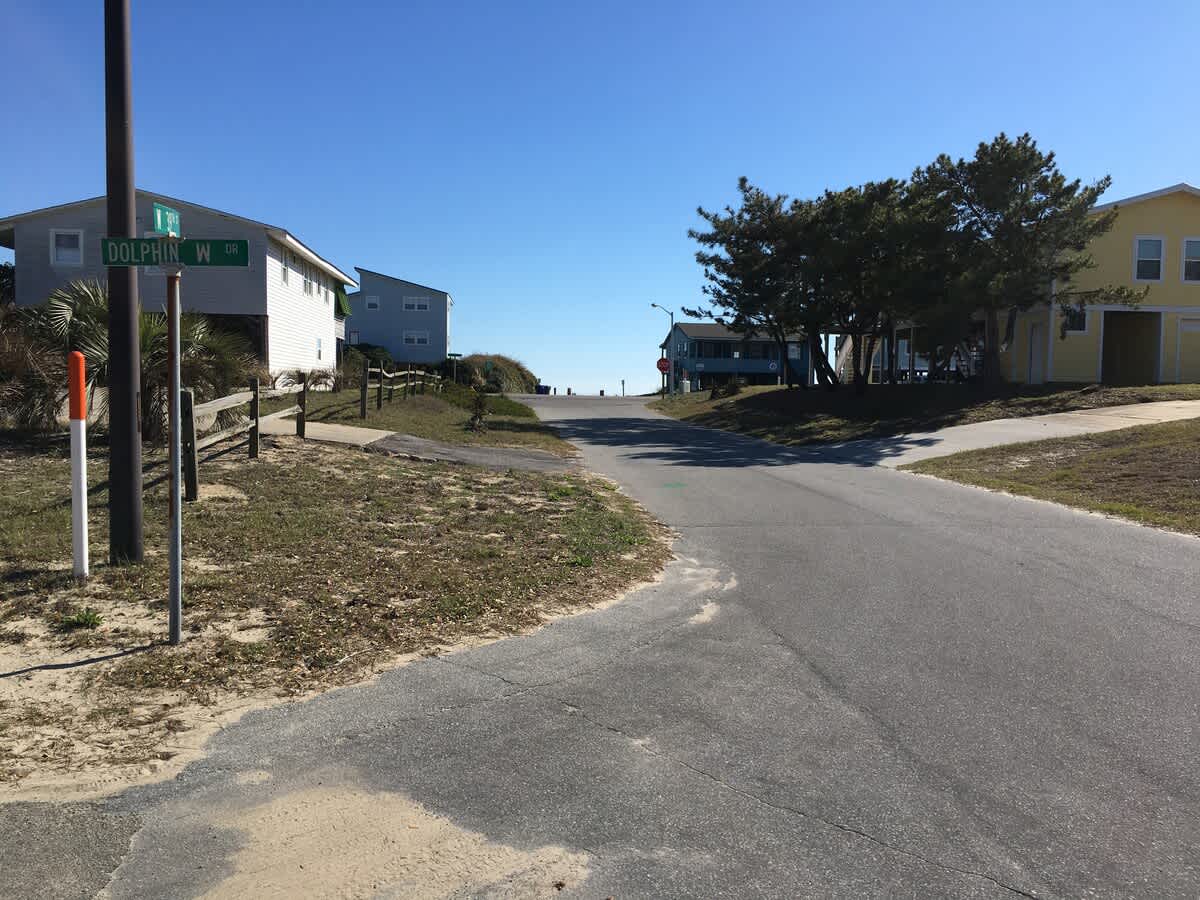 Walk from W Dolphin to the beach access.