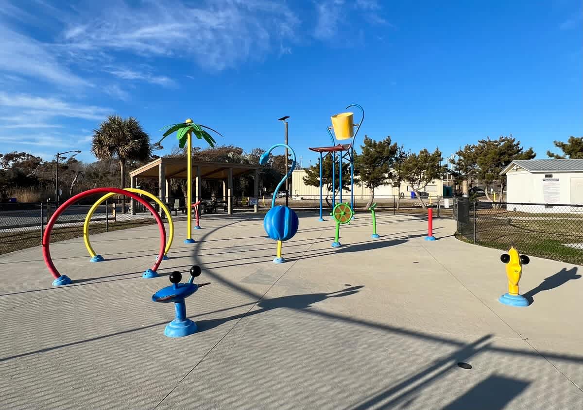 Enjoy a fun-filled day at Oak Island's Splash Pad - Located behind Town Hall on SE 46th Street.