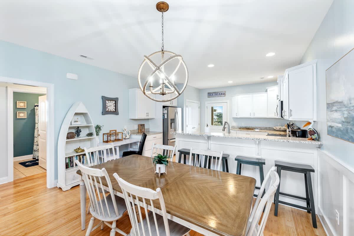 The kitchen is open to the dining room and the living room, allowing conversation to flow easily.
