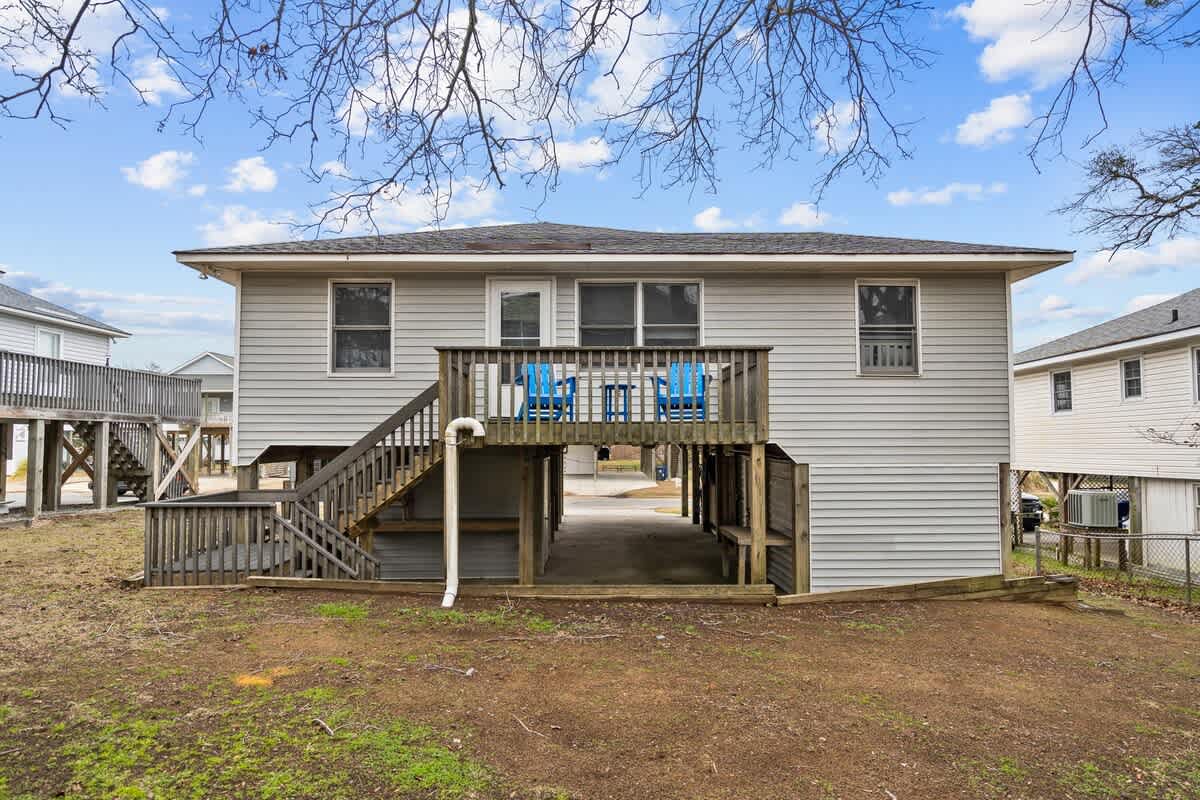 The big back yard has plenty of space for the kids to play. 