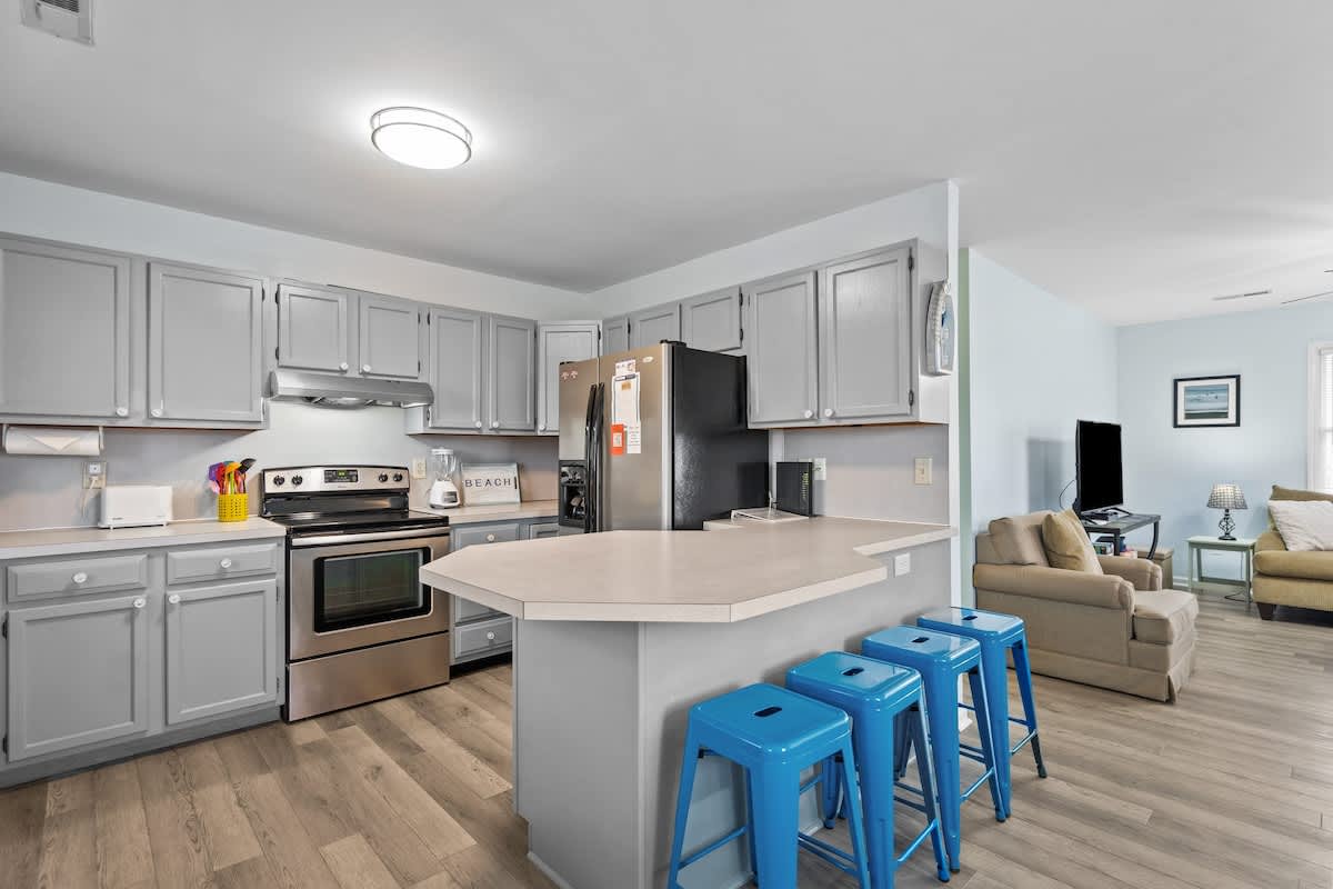 Seat four extra guests at this uniquely shaped island.