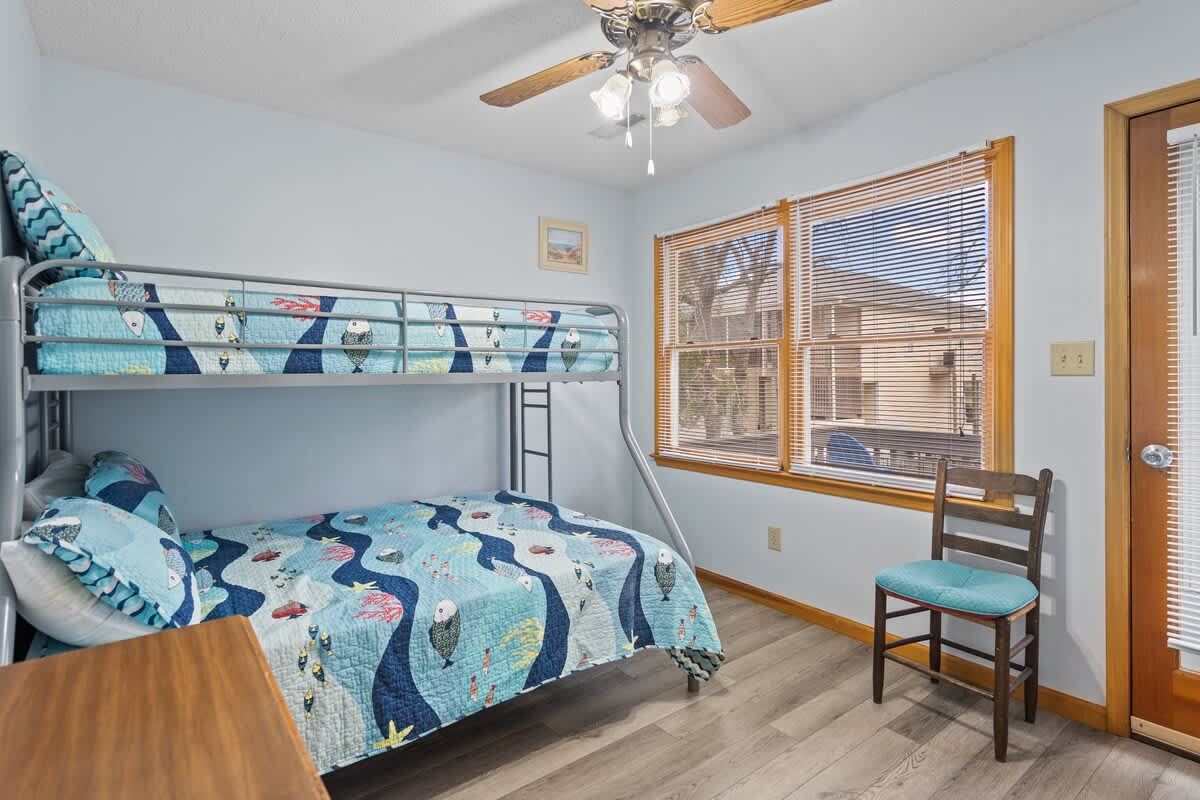 Perfect for kids, this room has a bunk bed - double on the bottom, twin on the top - and it's own roku-enabled television.