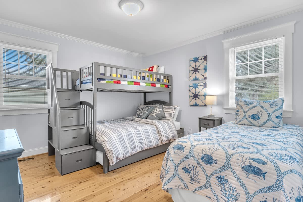 third BR has twin over full bunk bed and twin bed on the opposite wall