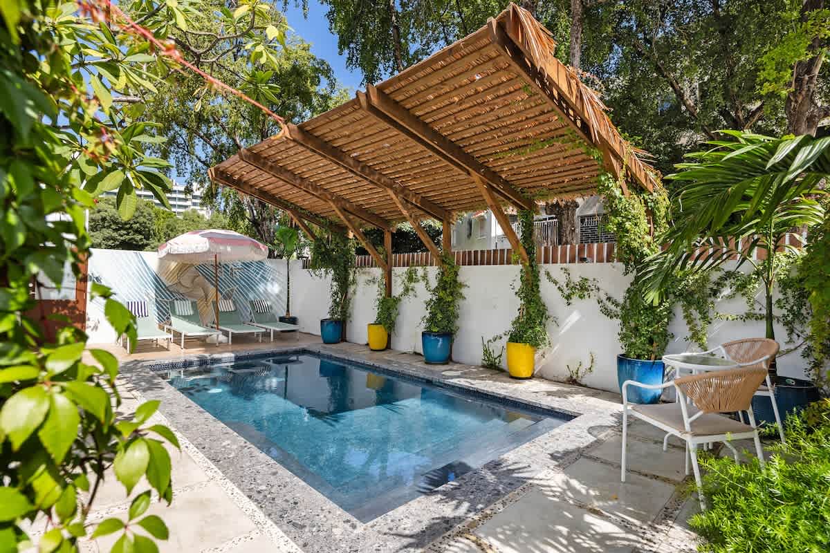 Condado Flat | Swimming Spot & Garden Haven