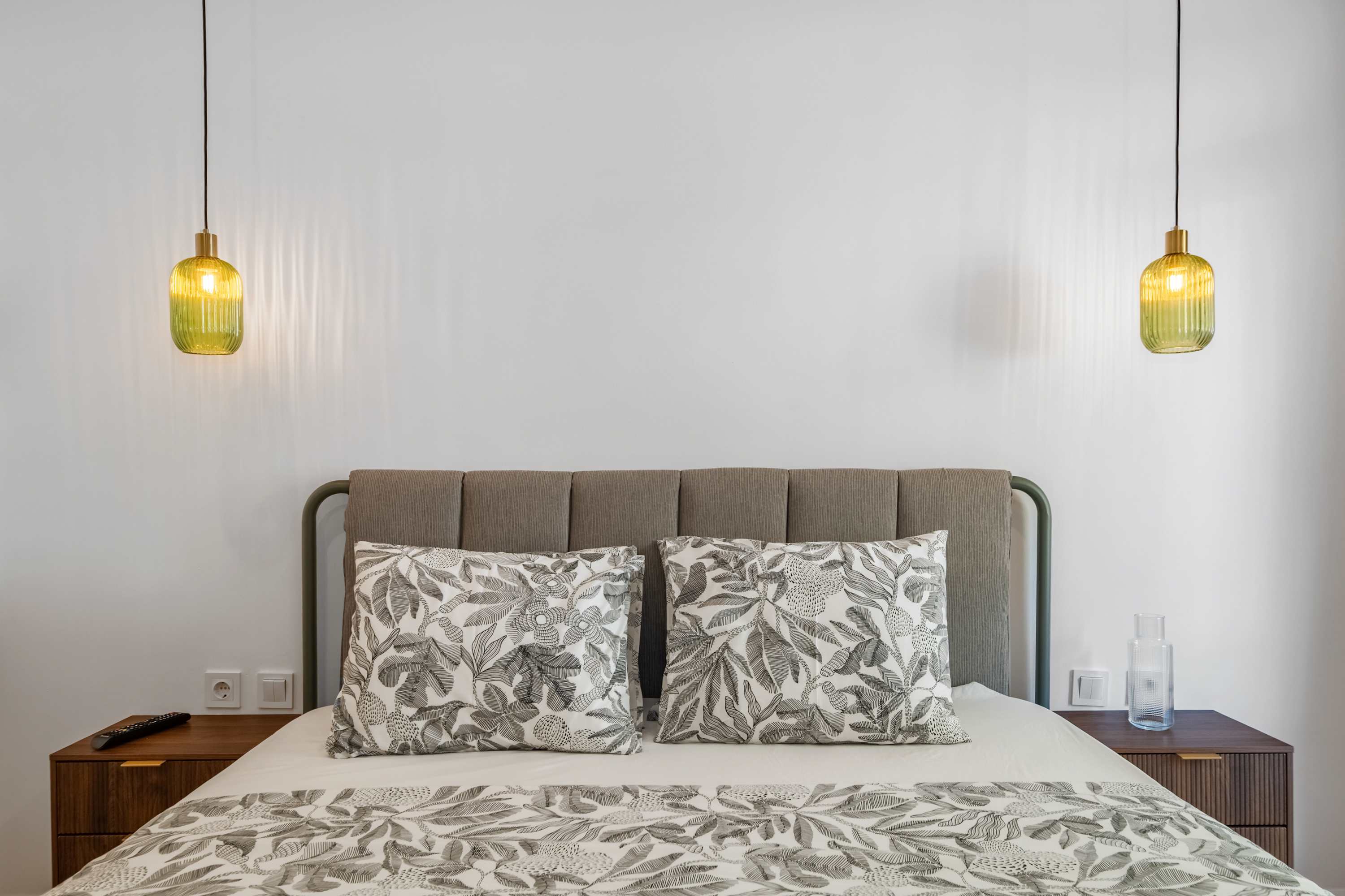 Bedroom with curtains opening onto the balcony