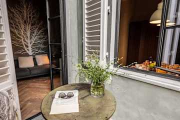 Case of flowers on a small round table