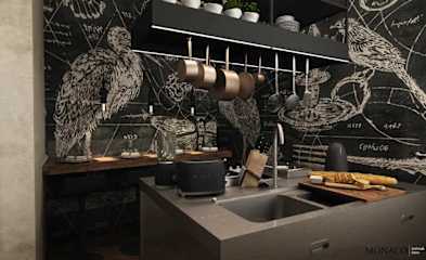 Pans hanging over a dark grey kitchen island
