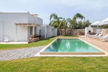 White walled masseria in Puglia with a pool