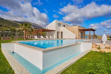 Modern brick and cream villa with pool