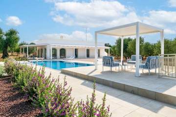 Chairs next to a swimming pool