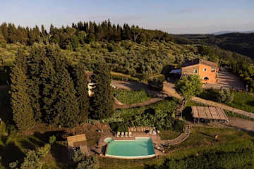 Aerial view of a house and swimming pool