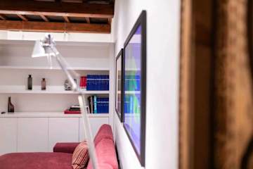 Living room with colourful paintings