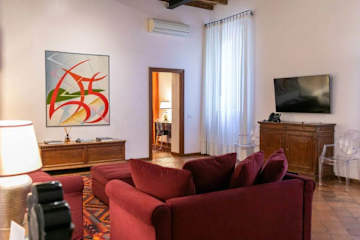 Living room with red sofa