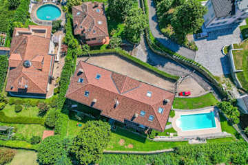 Drone view of an apartment building with pool