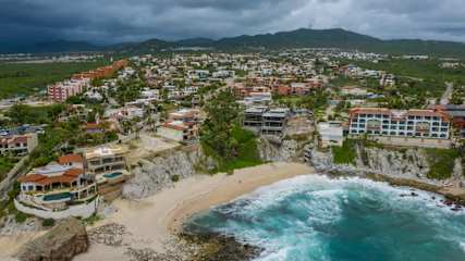 Cabo Bello Community - Private Beach.  Casa Famlee located top left near brown buildings