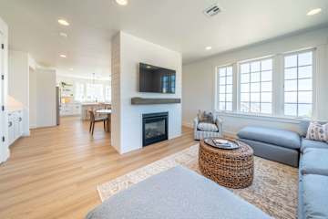 Open living area with smart TV and fireplace