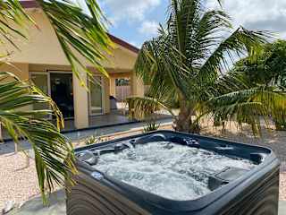 Kas Cocita met een jacuzzi, privétuin en buitenruimte op de wind