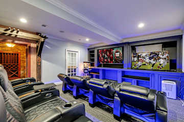 Grab the popcorn and claim your recliner — tiered leather seating, dual screens, and blue LED glow the second the lights go down.