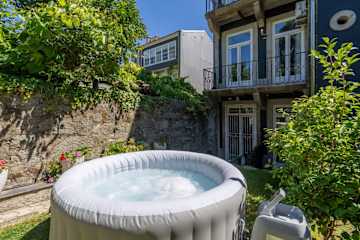 3 Spacious Flats w/ Jacuzzi & Garden by HostWise photo 2