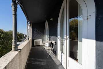 Rustic Elegant Flat | Terrace by HostWise photo 2