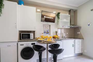 Sweet Cozy Flat w/ Balcony by HostWise photo 3