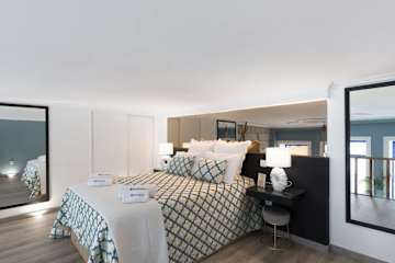 Deluxe Spacious Flats w/Mezzanine by HostWise photo 3