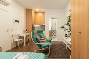 Cozy Studios w/ Terrace | City Center by HostWise photo 3