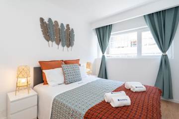 Cozy Bright Flats w/ Netflix | Garage by HostWise