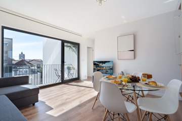 Bright & Luxurious Flat w/ Balcony by HostWise photo 2