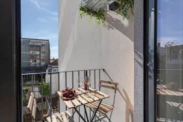 Bright & Luxurious Flat w/ Balcony by HostWise photo 3