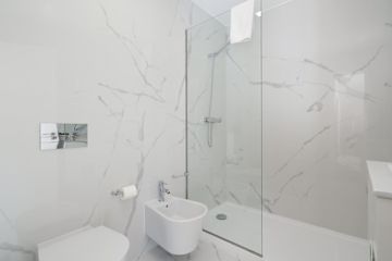 Bright & Luxurious Flat w/ Balcony by HostWise photo 5