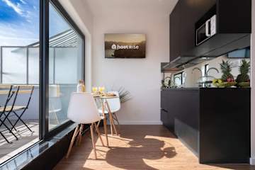 Bright Flat w/ Balcony |  Ace Location by HostWise photo 3